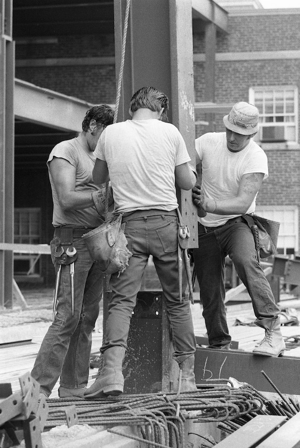 Workers fixing steel column on a Sydney site in the 1970s