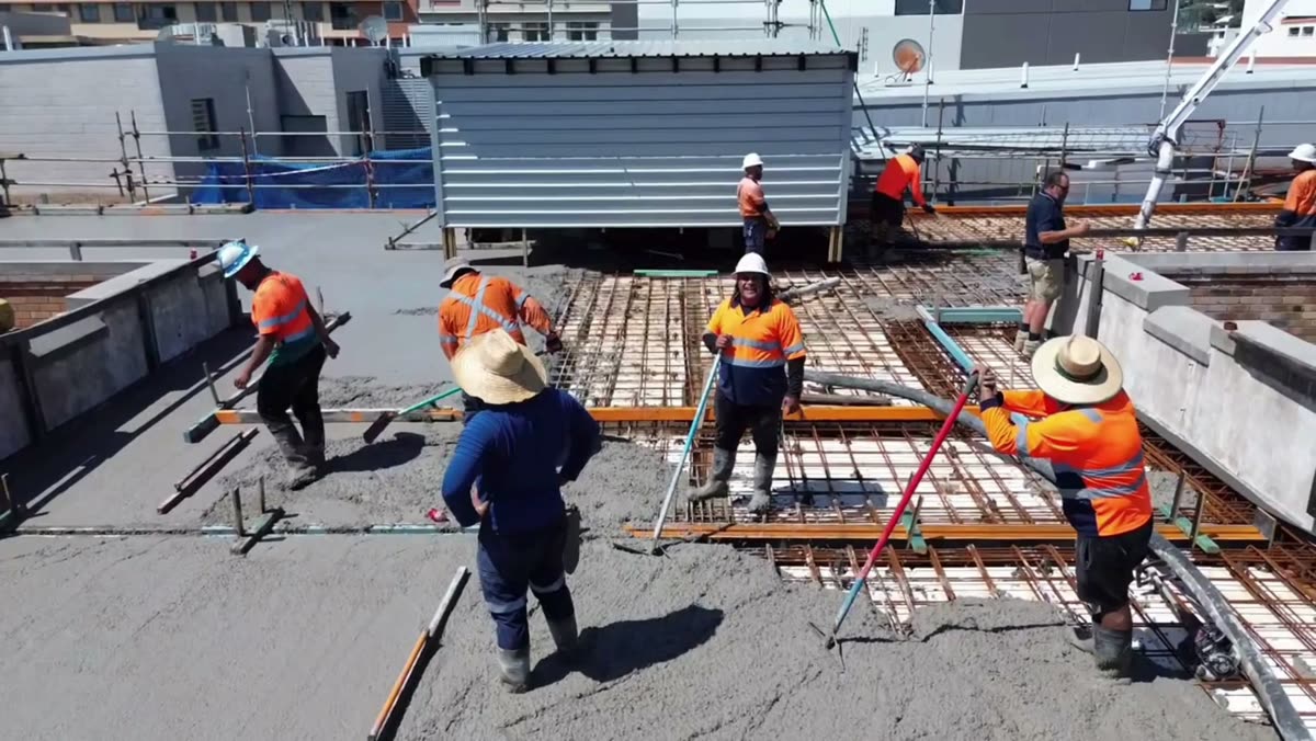 METCON crew pouring a reinforced concrete slab on a Sydney rooftop
