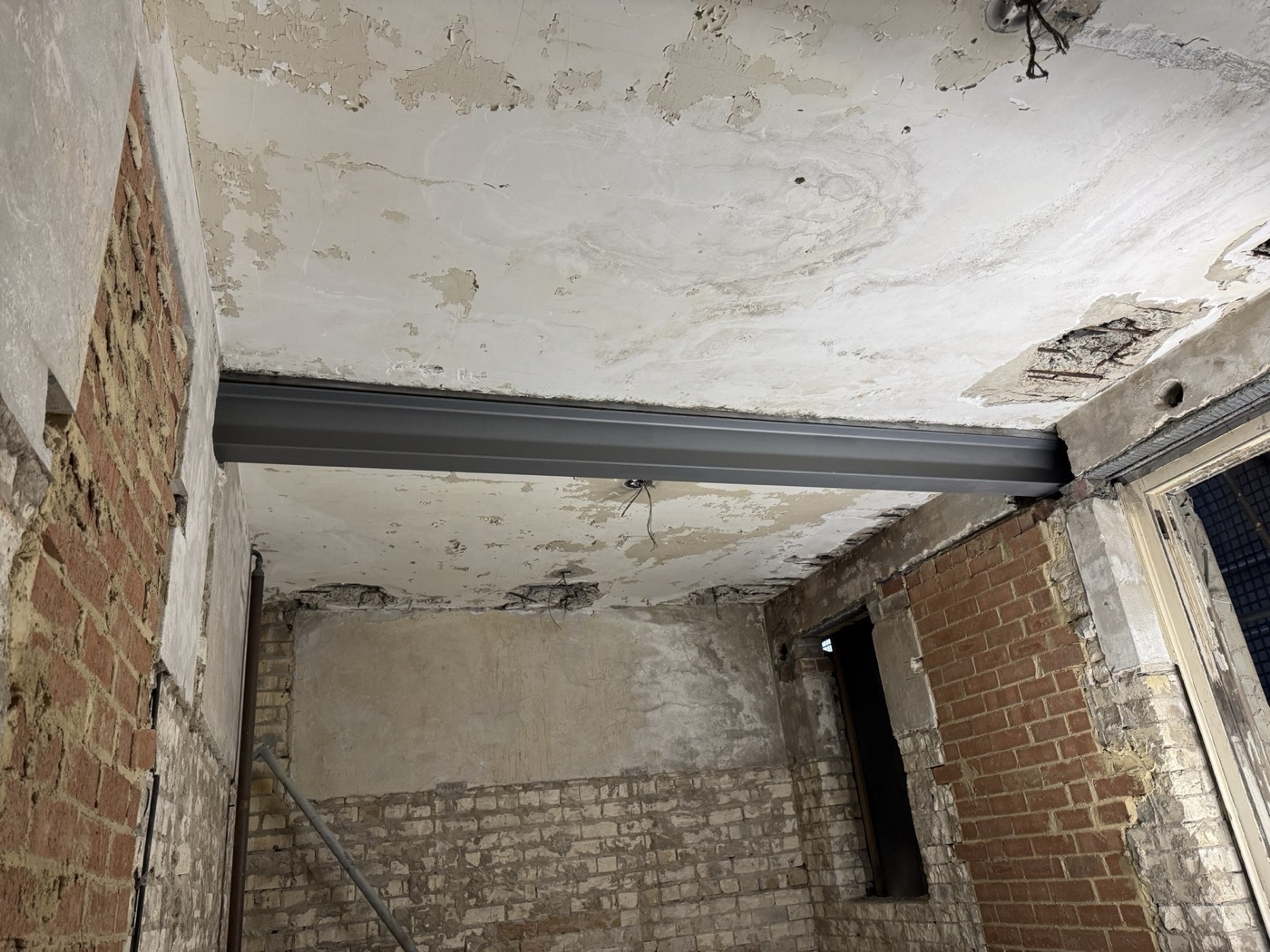 New steel bearing on brick walls
