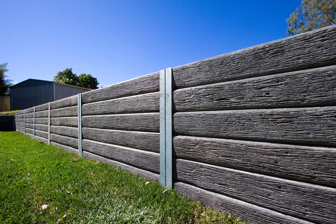 Timber-look concrete sleeper retaining wall built by METCON